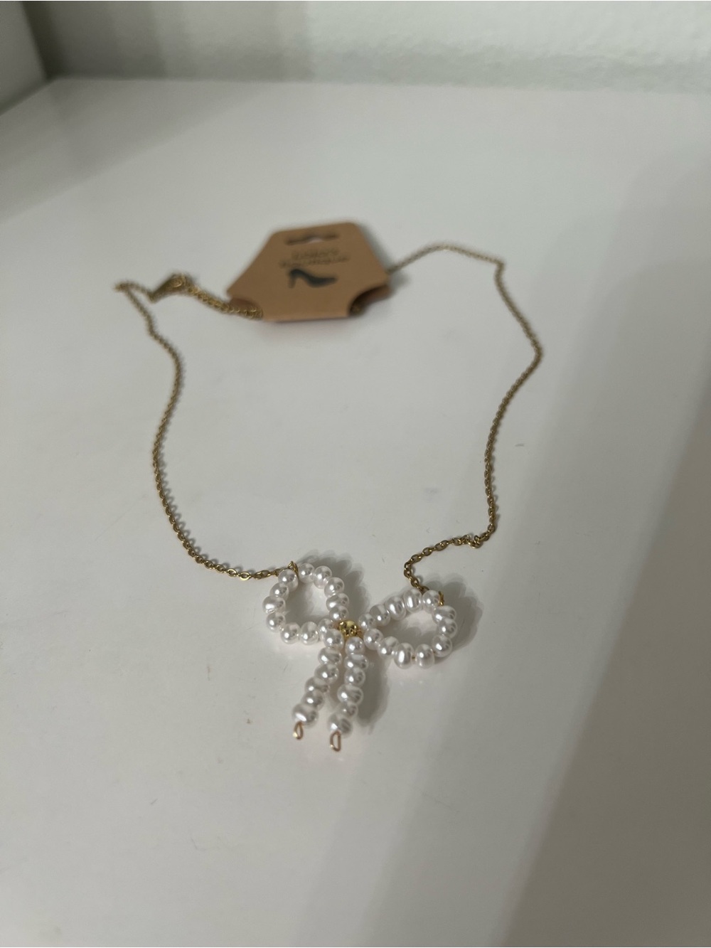 Fashion Gold Chain Necklace with Pearl Bow Pendant